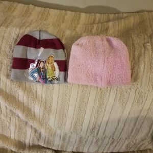 Pink beanie and Hannah Montana beanie